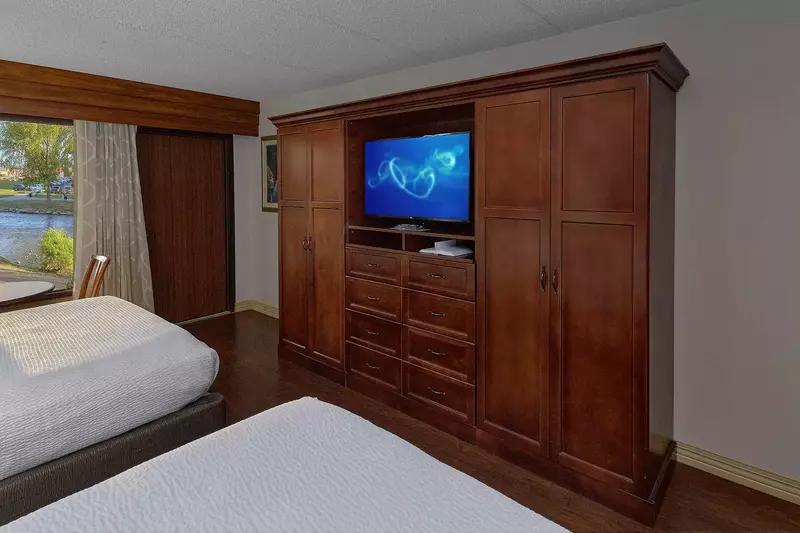 Two Queen Beds facing TV