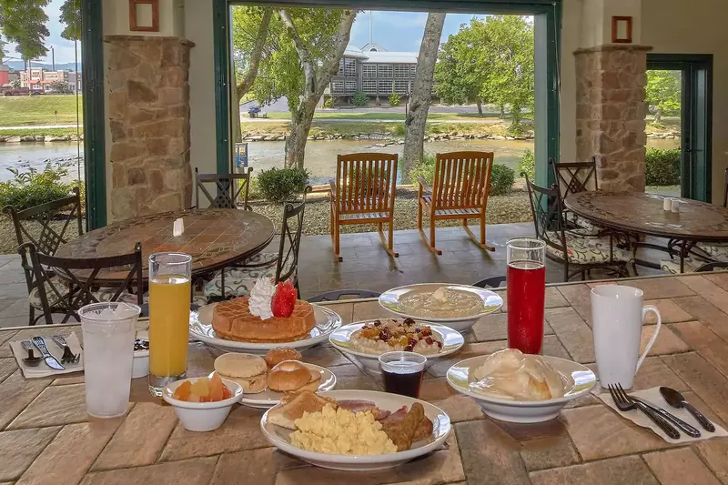 complimentary breakfast spread on patio at The Inn on the River