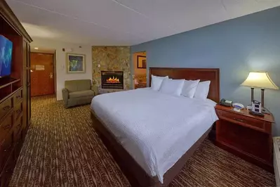 king room with fireplace at The Inn on the River