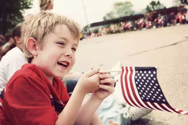 Boy watching 4th of July parade