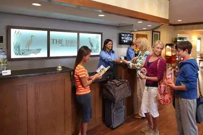 Guests in the lobby of The Inn On The River.