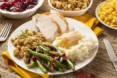 A plate of tasty Thanksgiving food.