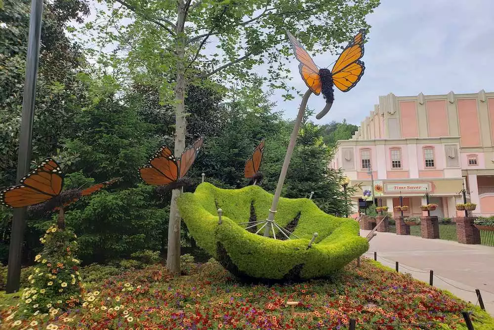 umbrella flower sculpture and butterflies at Dollywood's Flower & Food Festival